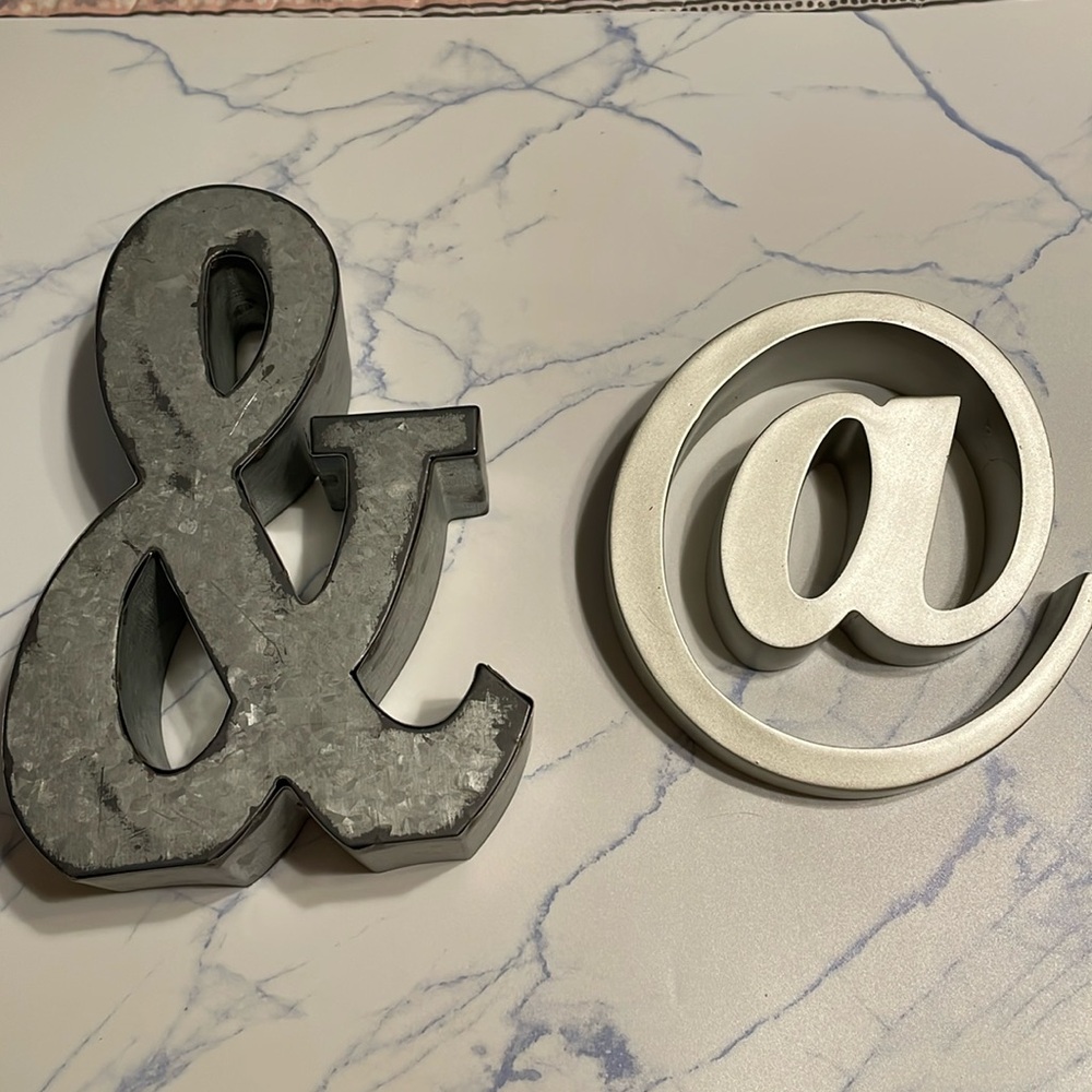 Set of 2 signs-1 galvanized metal & sign & 1 hard plastic @ sign both are silver